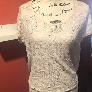 White Lace front, cream colored sheer back.